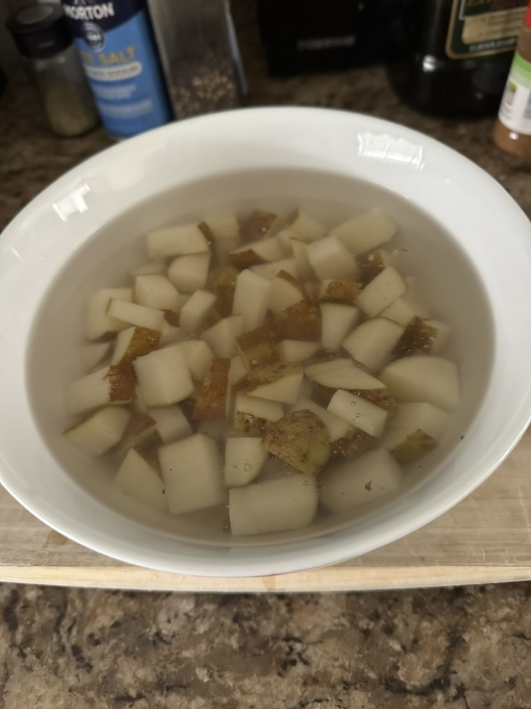 potatoes submerged in water